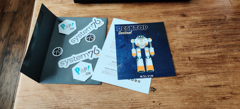 Contents of the System76 branded envelope