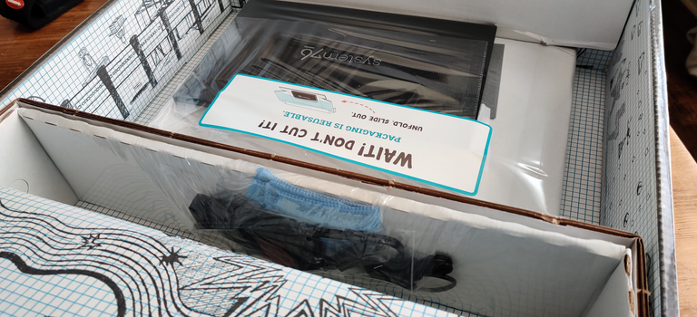 System76 Lemur Pro packaging, behind
